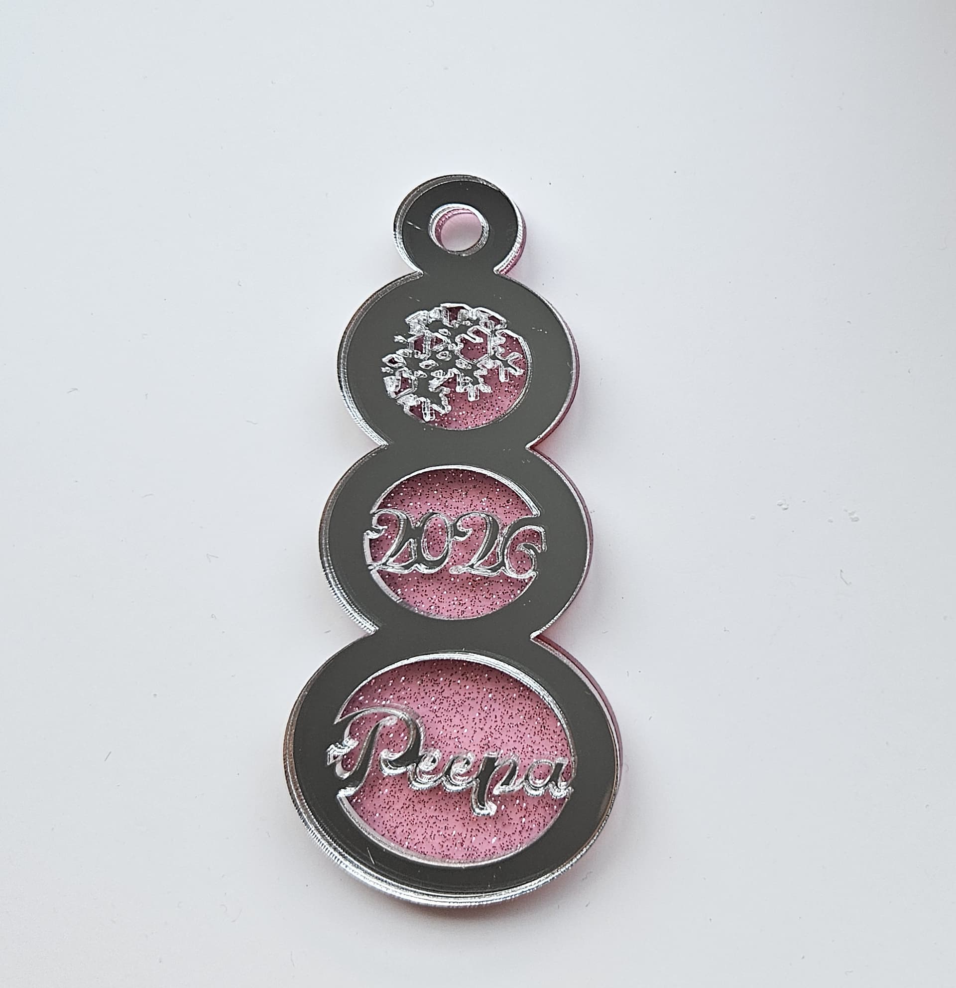 Pink glitter snowman ornament with sparkle finish
