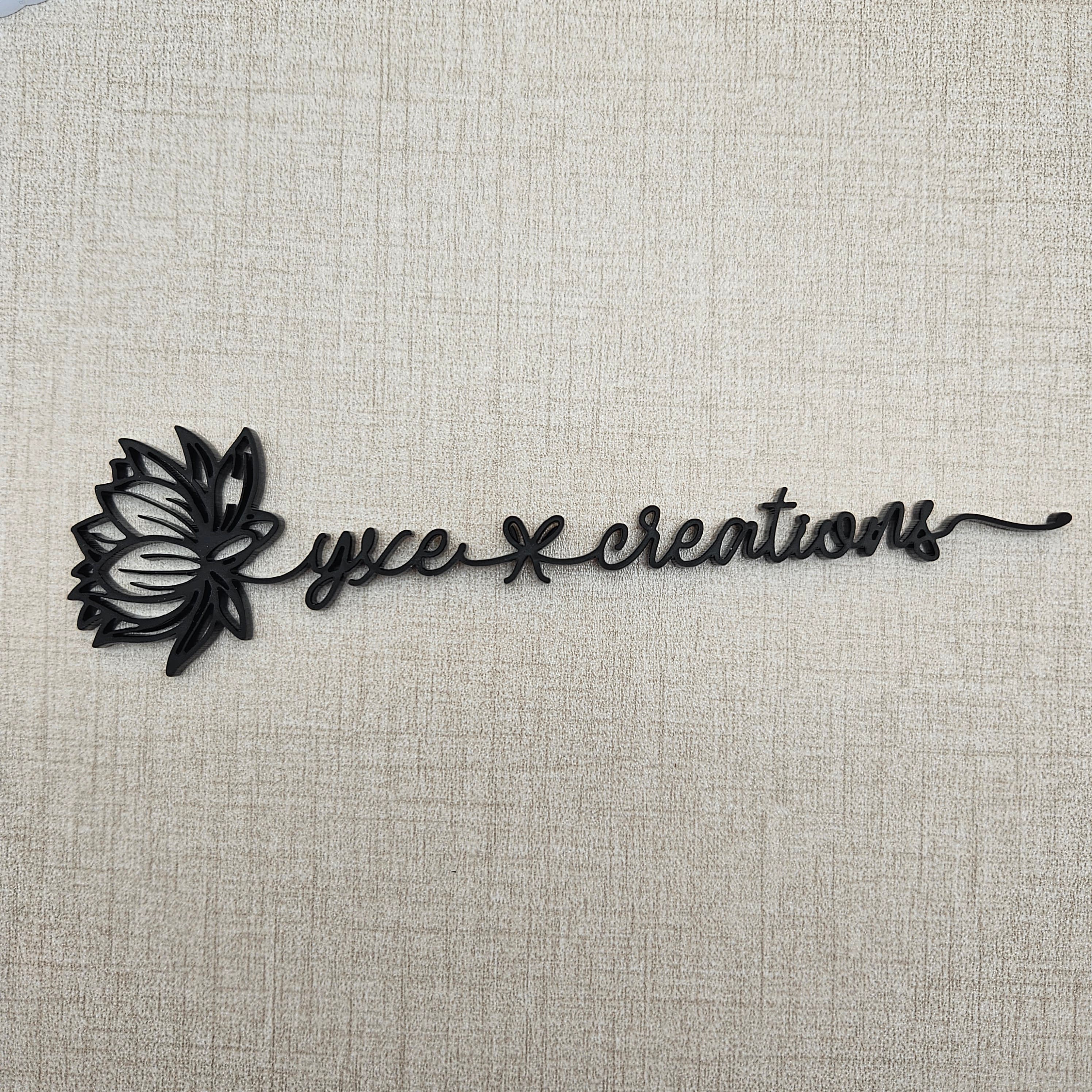 Connected text with flowers and tails