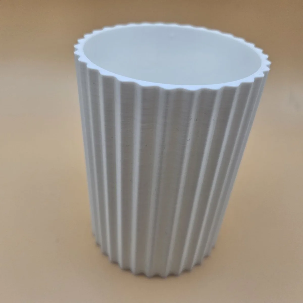 3D printed ribbed vase in white PLA